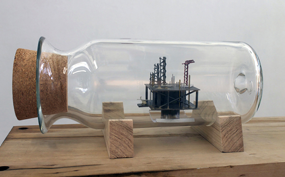 An oil rig in a bottle, by Darryl Lauster.