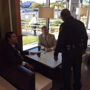 Chief McClelland reassures an old white man that he will continue to protect the interests of the landed gentry.